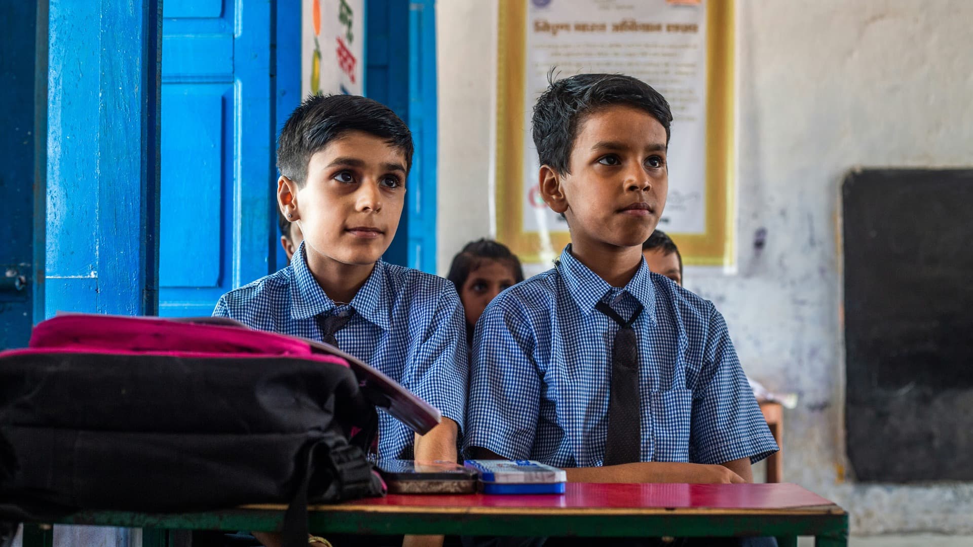 Indian school students learning in a bright classroom — phonics and reading